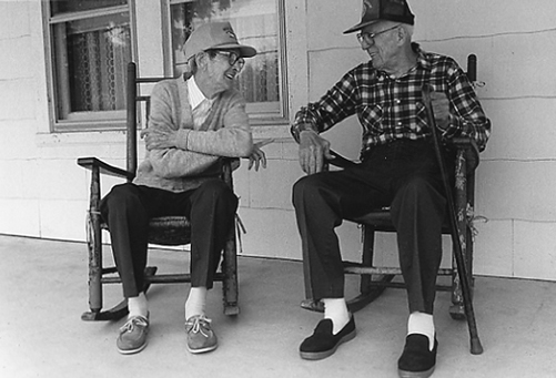 Ed Fisher and George Tucker "jawing" on the porch, Oella