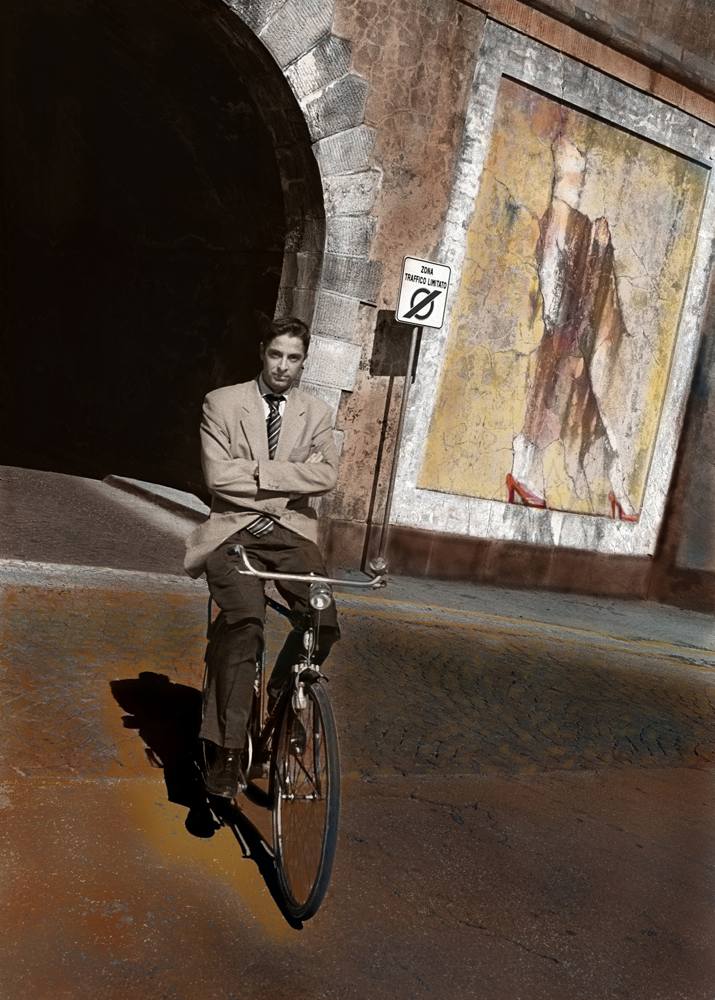 Lucca Italy  Man on Bicycle mural behind. Colored digital print