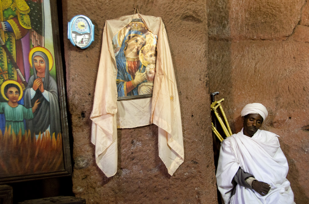 Priest with icons, Lalibela