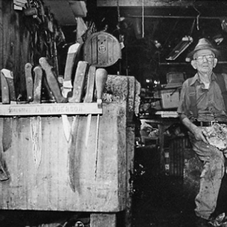 Paul Corum, game butcher, with turtle shell and tools of the trade, Ellicott City