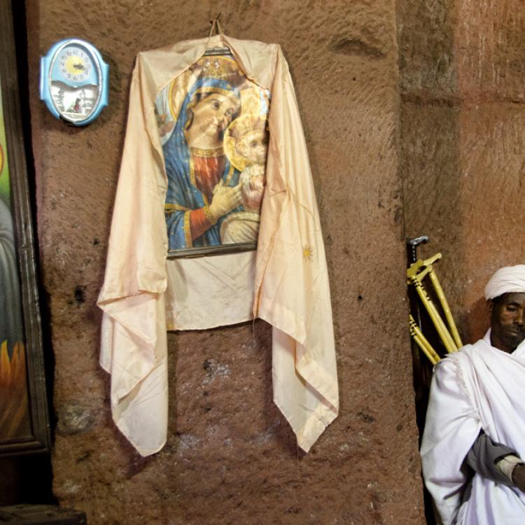 Priest with icons, Lalibela