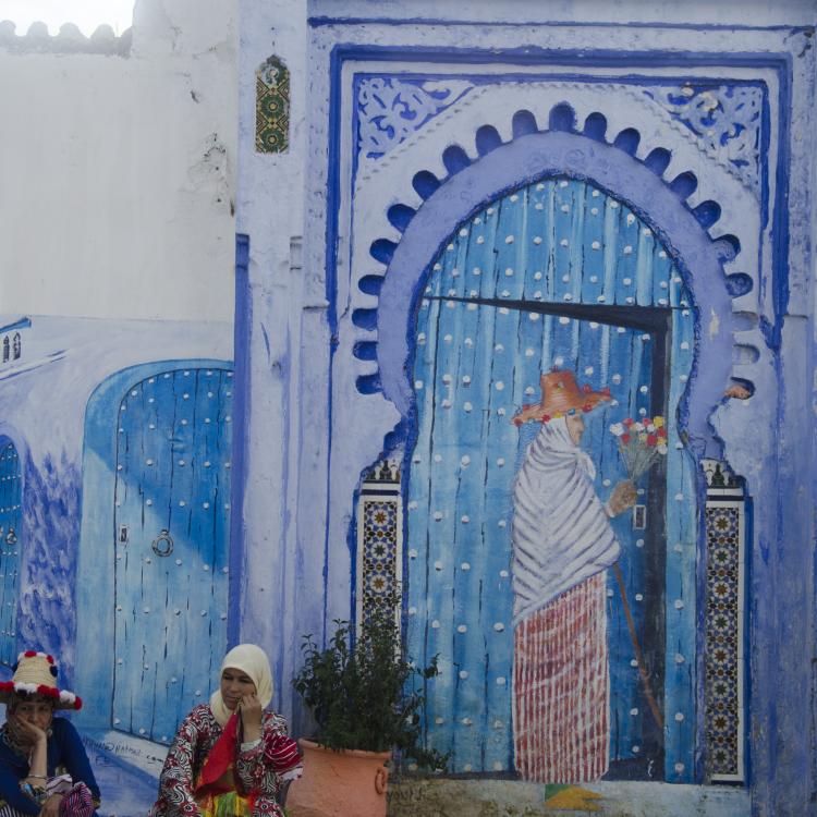 women and mural
